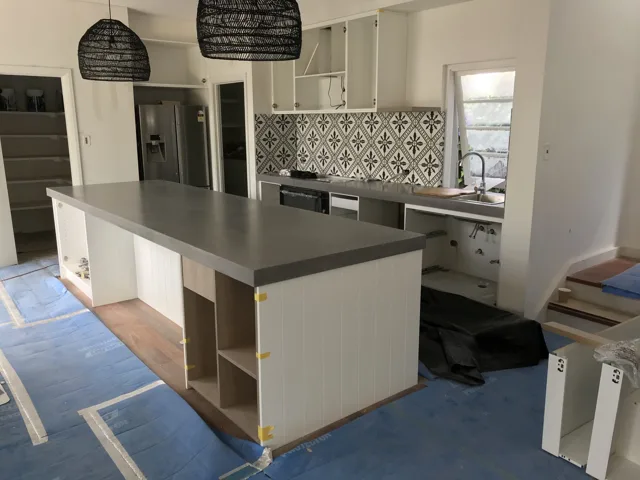 Kitchen installation: Island and kitchen surfaces during installation.