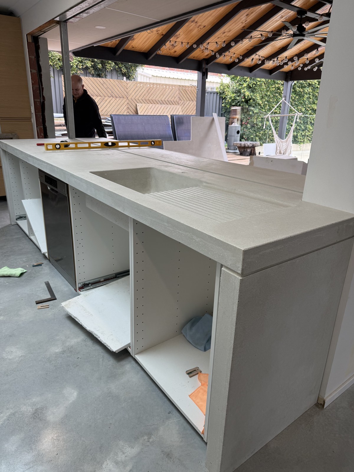 Sink & drainer detail: A benchtop with sink and drainer during installation.